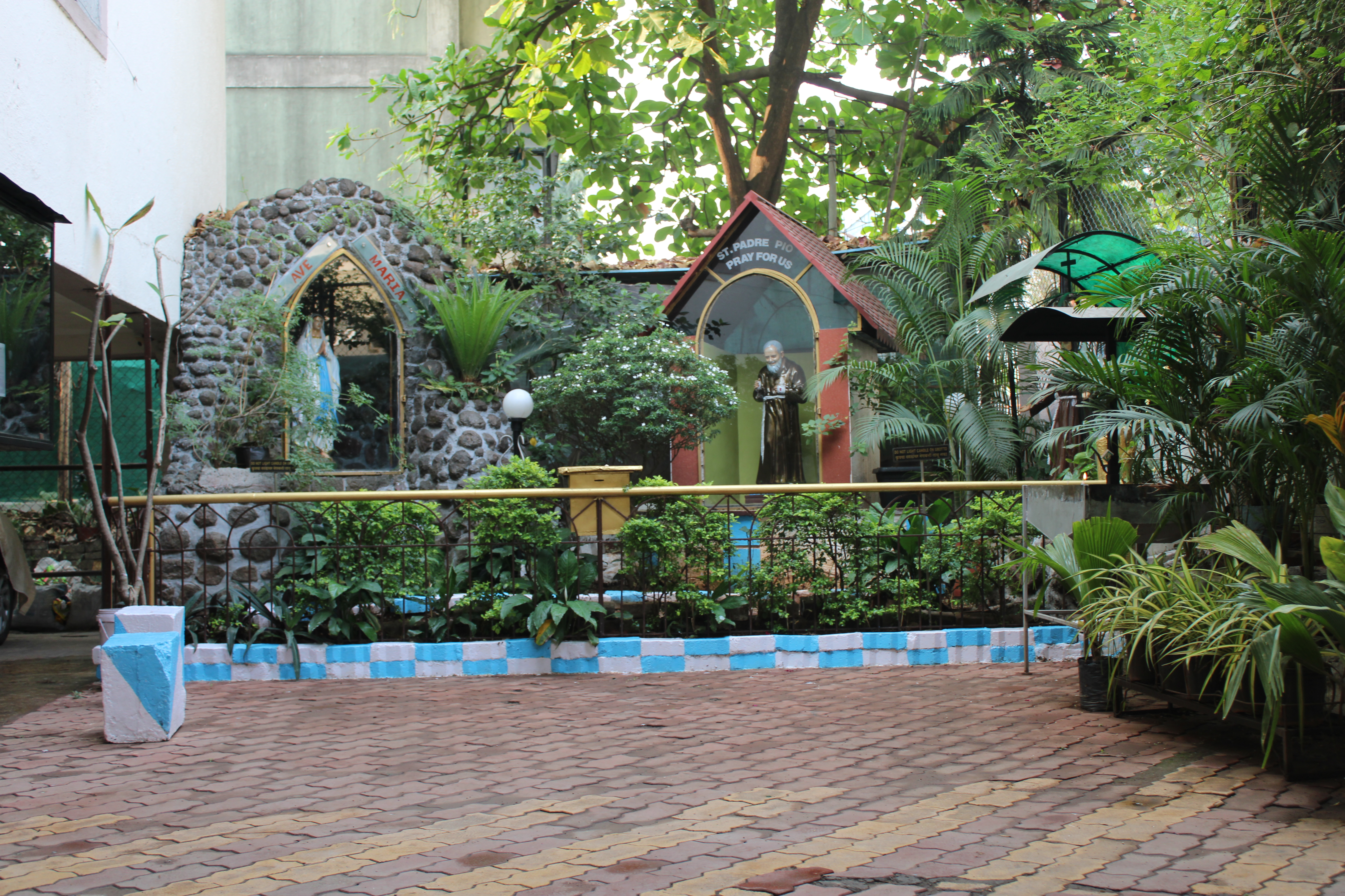 Grottoes of Our Lady of Lourdes, St. Padre Pio and St. Francis of Assisi